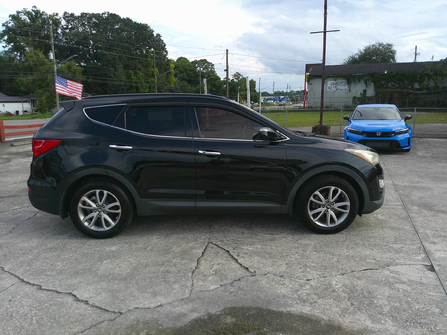 2014 BLACK HYUNDAI SANTA FE SPORT 2.0T (5XYZU3LA6EG) , located at 1200 Cassat Avenue, Jacksonville, FL, 32205, (904) 695-1885, 30.302404, -81.731033 - Photo#2